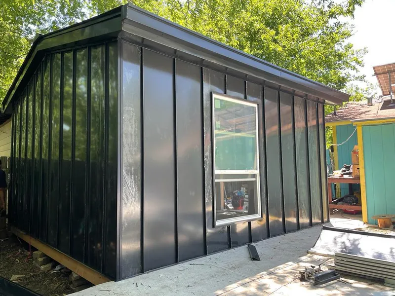 Black standing seam metal wall panels for Roof Inspection in Shady Hollow