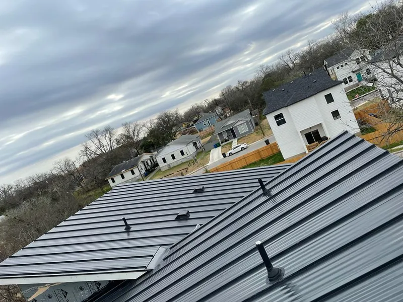 Standing seam metal roof panels with vents for Skylight Repair in Shady Hollow